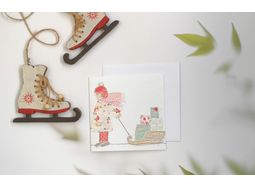 Christmas Card featuring girl with sleigh and presents with FREE UK Postage! alternative